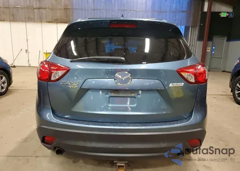 2016 Mazda Cx-5 Touring z USA, uszkodzony, nr VIN JM3KE4CY9G0906569